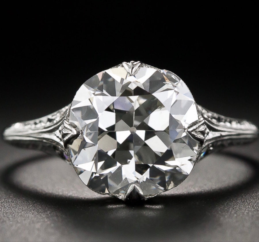 Platinum 1ct Diamond Cushion Shape Halo Bridal Set | Ernest Jones